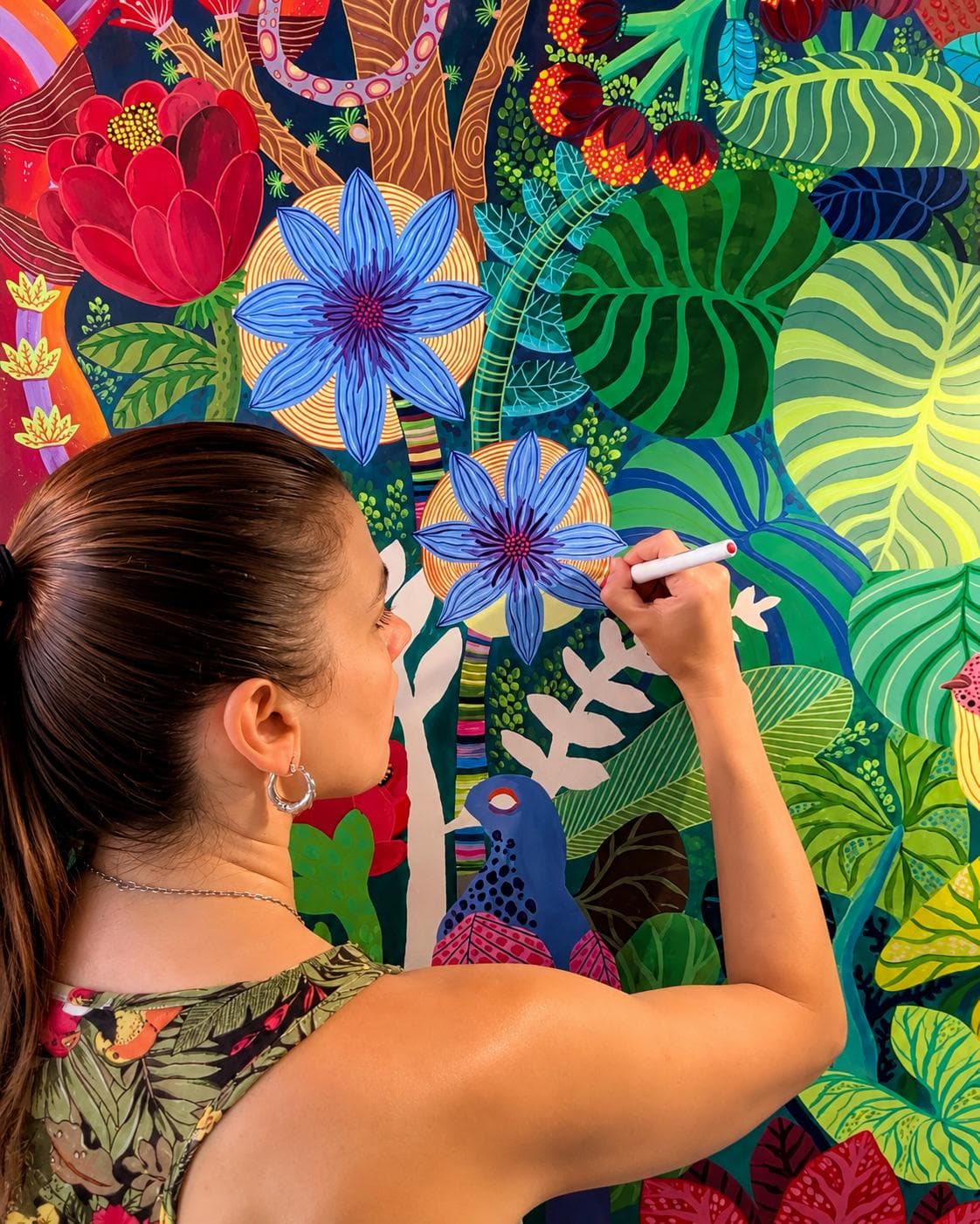Coty Borio pintando una de sus obras